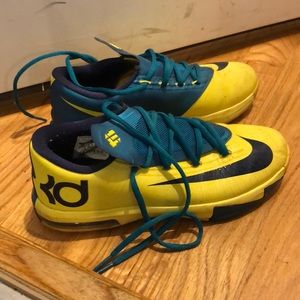 Neon and blue men’s and women’s size 5Y sneakers